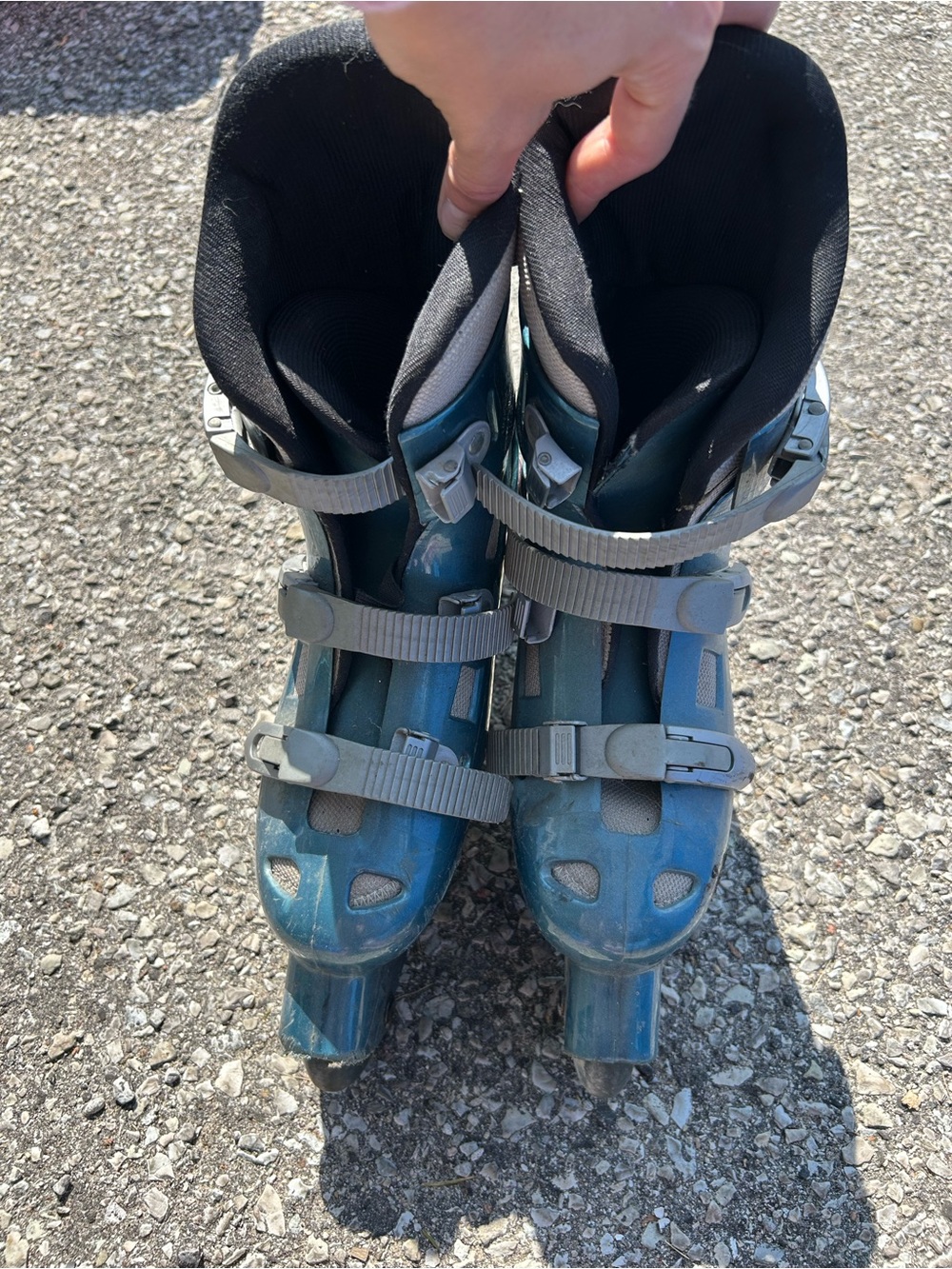 Adjustable Teal Rollerblades with Gray Buckles